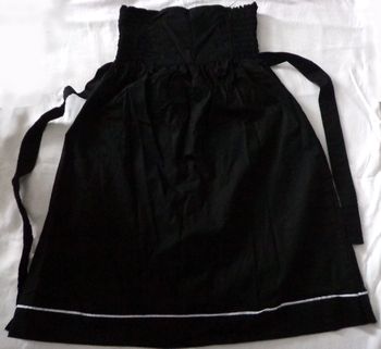 Vestido preto.